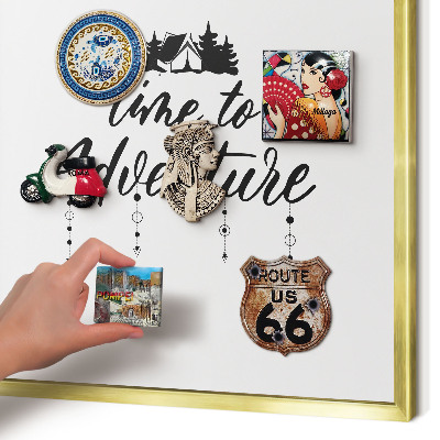 Magnetic board for magnets in a gold frame Adventure awaits
