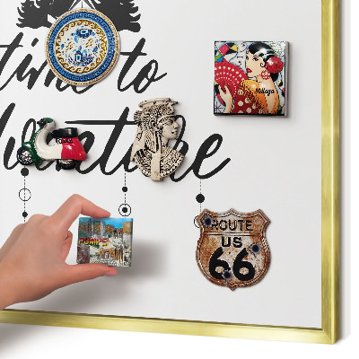 Magnetic board for magnets in a gold frame Adventure awaits