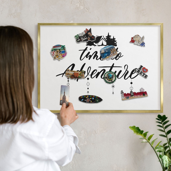 Magnetic board for magnets in a gold frame Adventure awaits