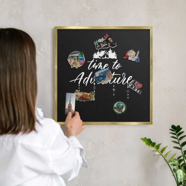 Metal magnet board with a gold frame Adventure awaits