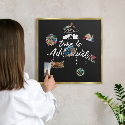 Metal magnet board with a gold frame Adventure awaits