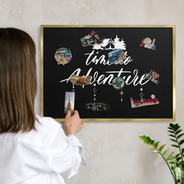 Metal magnet board with a gold frame Adventure awaits