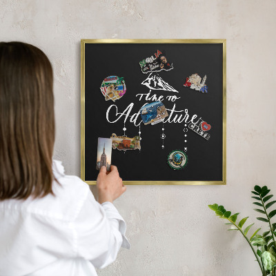 Metal magnet board with a gold frame Adventure awaits