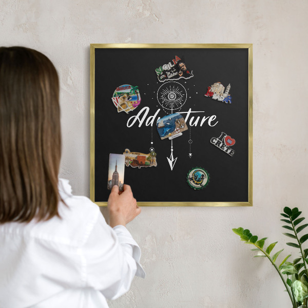 Metal magnet board with a gold frame Adventure awaits