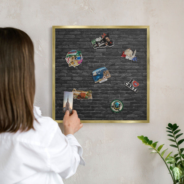 Magnetic board for magnets in a gold frame Brick wall