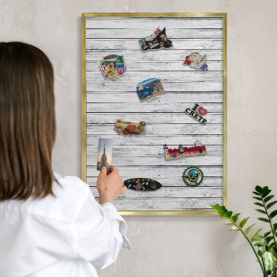 Magnetic board for magnets in a gold frame Light wood