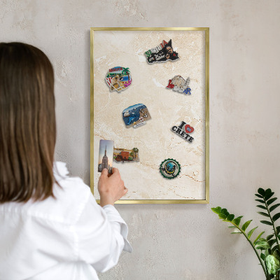 Metal magnet board with a gold frame Delicate marble