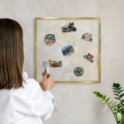 Magnetic board for magnets in a gold frame Subtle elegance