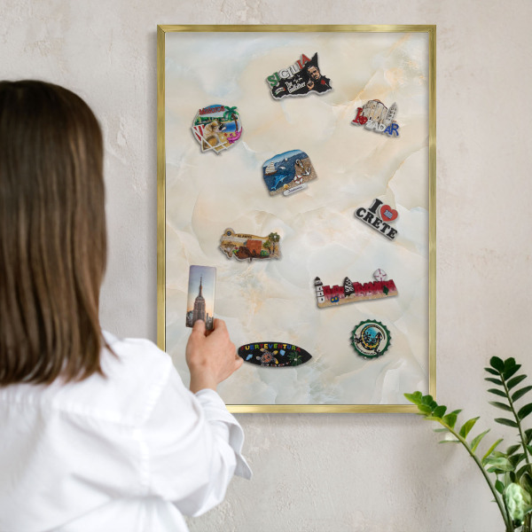 Magnetic board for magnets in a gold frame Subtle elegance