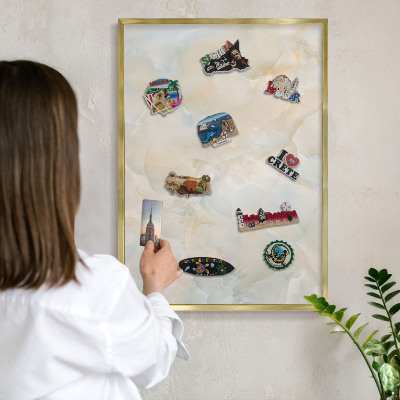 Magnetic board for magnets in a gold frame Subtle elegance