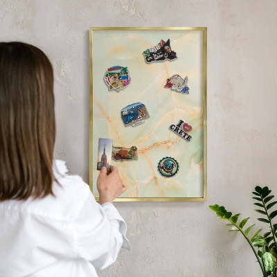 Magnetic board for magnets in a gold frame Marble elegance