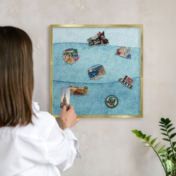 Metal magnet board with a gold frame Blue waves