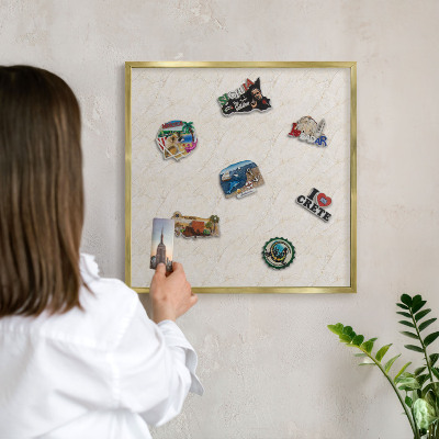 Metal magnet board with a gold frame Marble elegance