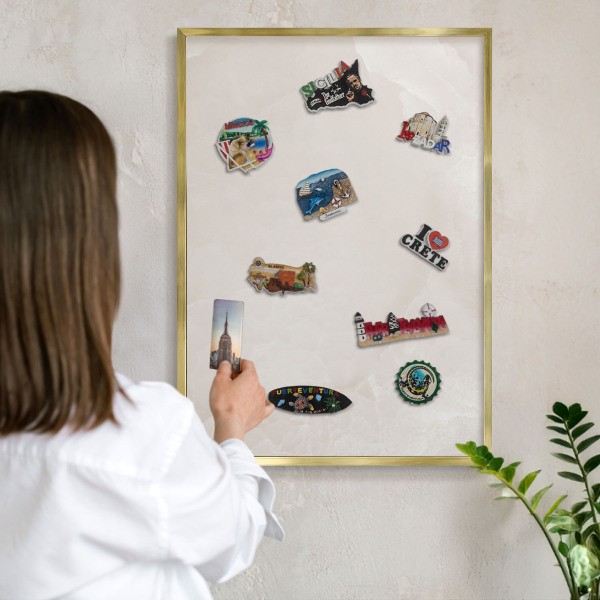 Metal magnet board with a gold frame Creamy texture