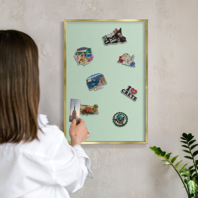 Metal magnet board with a gold frame Mint green