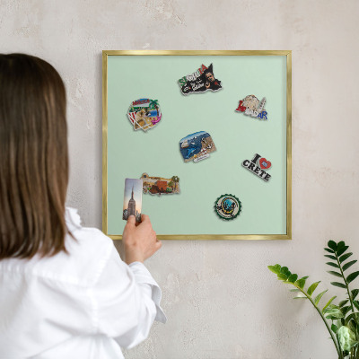 Metal magnet board with a gold frame Mint green