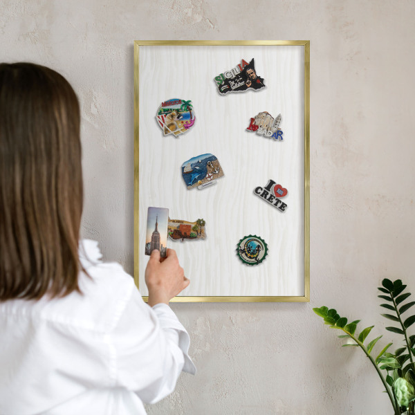 Metal magnet board with a gold frame Harmony of lines