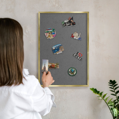 Magnetic board for magnets in a gold frame Gray texture