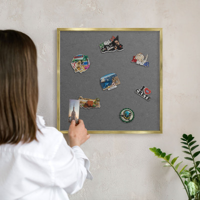 Magnetic board for magnets in a gold frame Gray texture