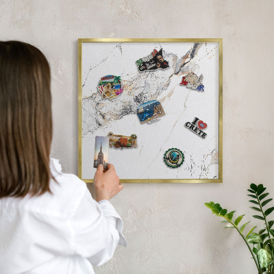 Magnetic board for magnets in a gold frame Marble effect