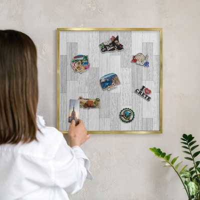 Metal magnet board with a gold frame Wooden texture