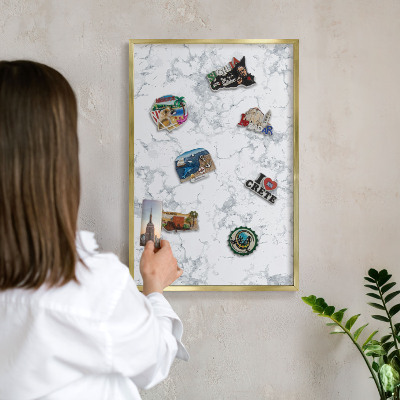 Magnetic board for magnets in a gold frame Marble aesthetics