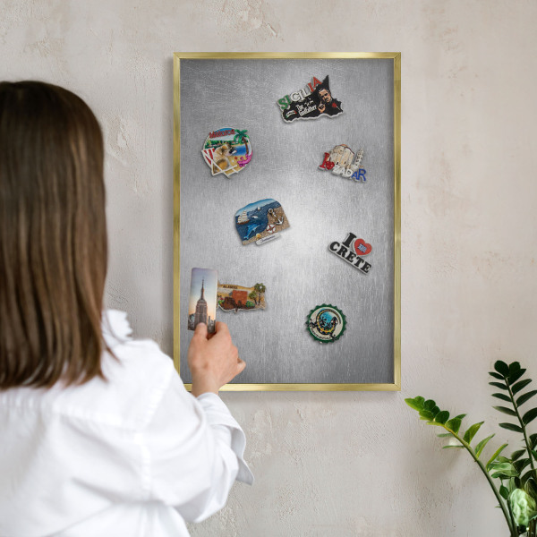 Metal magnet board with a gold frame Metallic surface