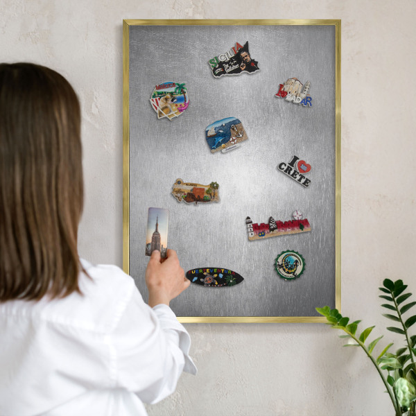 Metal magnet board with a gold frame Metallic surface