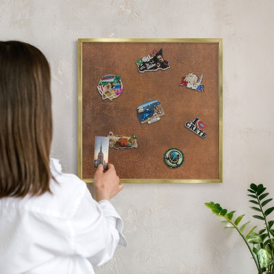 Magnetic board for magnets in a gold frame Brown texture