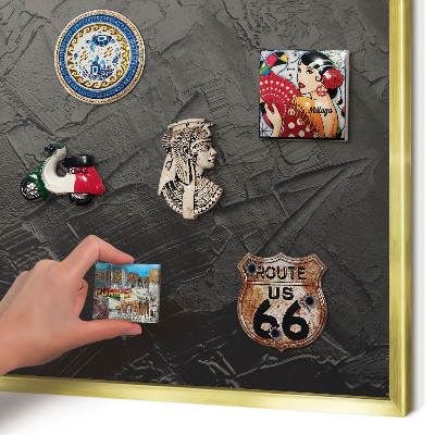 Metal magnet board with a gold frame Textured black