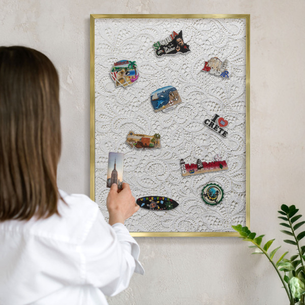 Magnetic board for magnets in a gold frame Openwork elegance