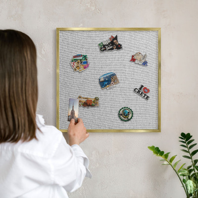 Metal magnet board with a gold frame Subtle elegance