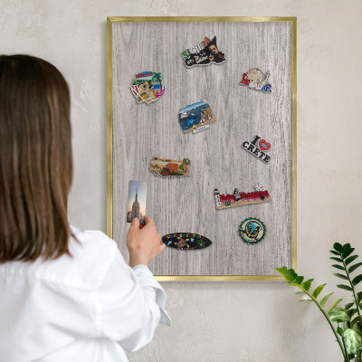Metal magnet board with a gold frame Wooden texture