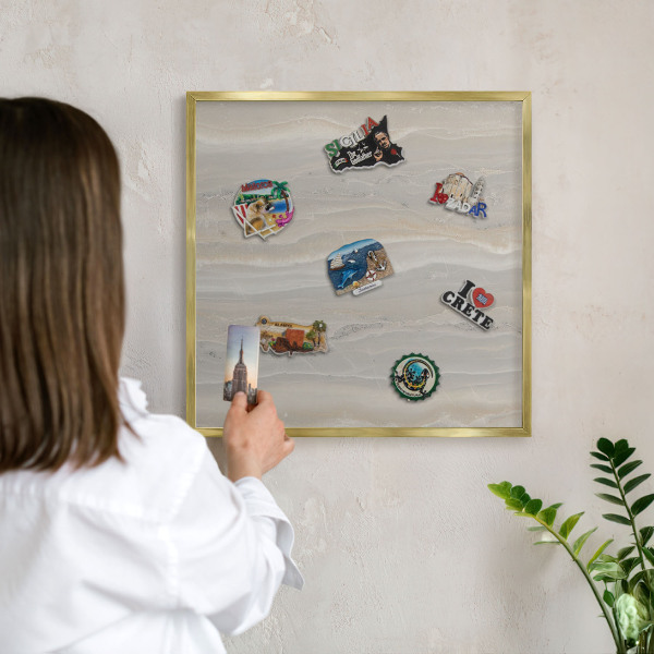 Metal magnet board with a gold frame Marble texture