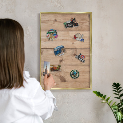 Magnetic board for magnets in a gold frame Wooden texture