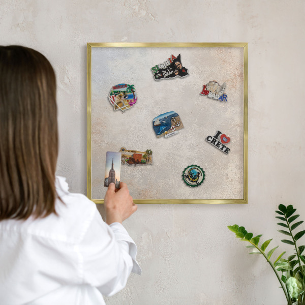 Metal magnet board with a gold frame Neutral background