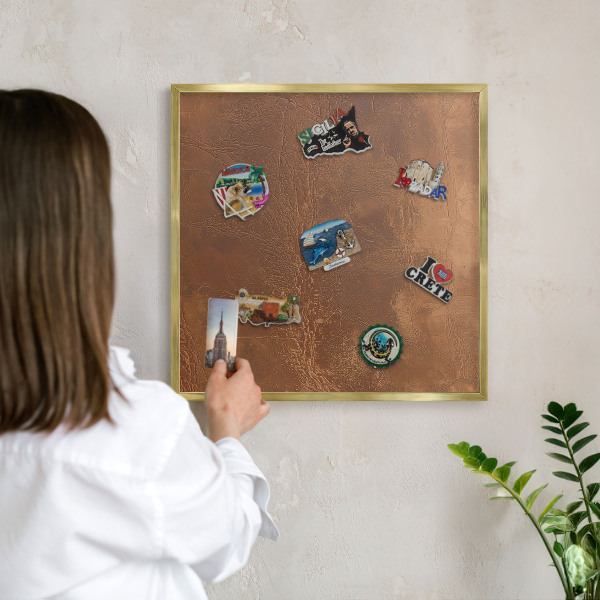Metal magnet board with a gold frame Brown texture