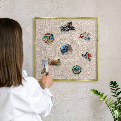 Metal magnet board with a gold frame Decorative mandala