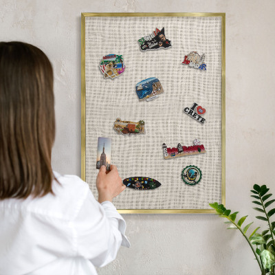 Metal magnet board with a gold frame Subtle elegance