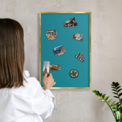 Metal magnet board with a gold frame Cool turquoise