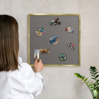 Magnetic board for magnets in a gold frame Dark gray