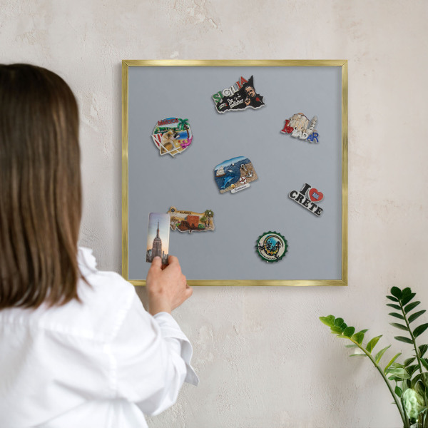 Metal magnet board with a gold frame Delicate gray