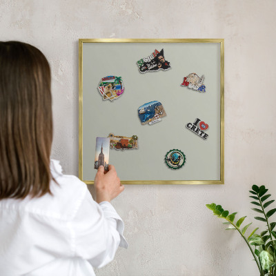 Magnetic board for magnets in a gold frame Warm gray