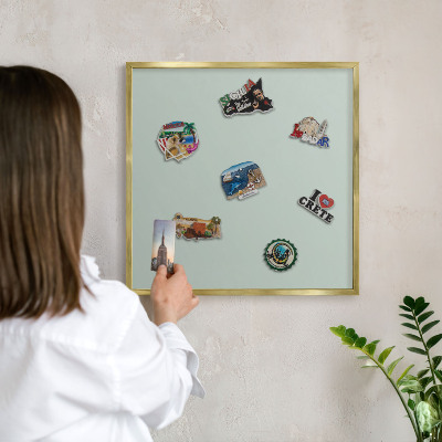 Metal magnet board with a gold frame Light mint