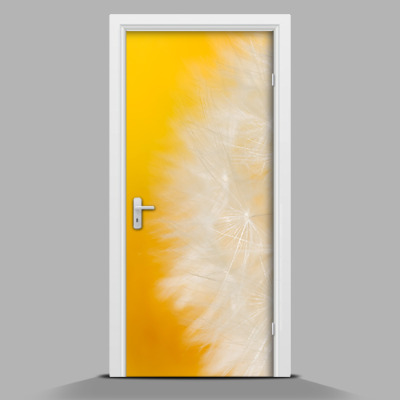 Door mural Dandelion on a yellow background