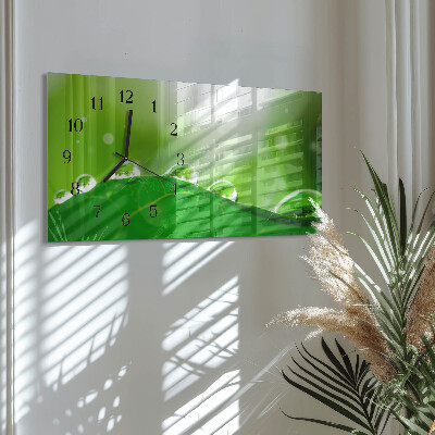 Horizontal wall clock Dew on a leaf